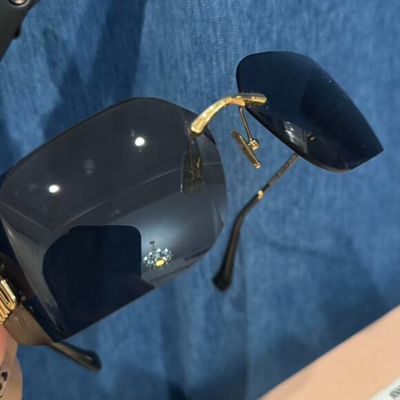 Miu Miu Oversized Shield Sunglasses Black Gold Chic - crrs.pl display picture 1